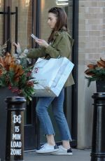 LILY COLLINS Out and About in Cincinnati 01/29/2018