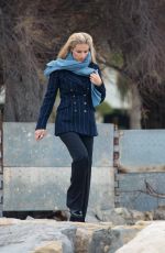 MICHELLE HUNZIKER Out for a Walk by the Sea in Sanremo 01/30/2018