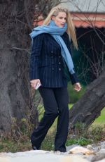 MICHELLE HUNZIKER Out for a Walk by the Sea in Sanremo 01/30/2018