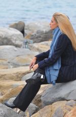 MICHELLE HUNZIKER Out for a Walk by the Sea in Sanremo 01/30/2018