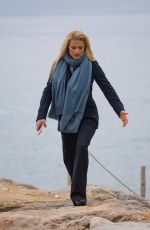 MICHELLE HUNZIKER Out for a Walk by the Sea in Sanremo 01/30/2018