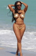 MORIAH MILLS in Gold Bikini at a Beach in Miami 01/17/2018