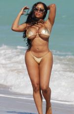 MORIAH MILLS in Gold Bikini at a Beach in Miami 01/17/2018