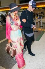 PARIS HILTON and Chris Zylka at LAX Airport in Los Angeles 01/24/2018