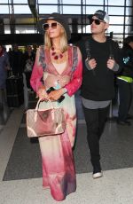 PARIS HILTON and Chris Zylka at LAX Airport in Los Angeles 01/24/2018