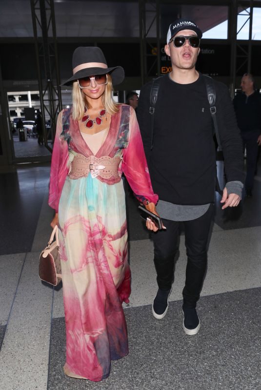 PARIS HILTON and Chris Zylka at LAX Airport in Los Angeles 01/24/2018