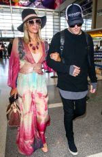 PARIS HILTON and Chris Zylka at LAX Airport in Los Angeles 01/24/2018