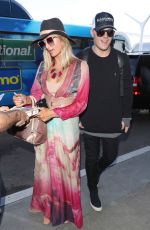 PARIS HILTON and Chris Zylka at LAX Airport in Los Angeles 01/24/2018
