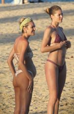 Pregnant CANDICE SWANEPOEL and DOUTZEN KROES in Bikinis at a Beach in Bahia 01/07/2018