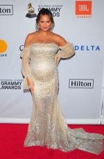Pregnant CHRISSY TEIGEN at Clive Davis and Recording Academy Pre-Grammy Gala in New York 01/27/2018