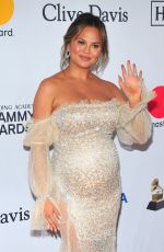 Pregnant CHRISSY TEIGEN at Clive Davis and Recording Academy Pre-Grammy Gala in New York 01/27/2018