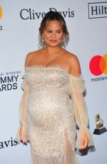 Pregnant CHRISSY TEIGEN at Clive Davis and Recording Academy Pre-Grammy Gala in New York 01/27/2018