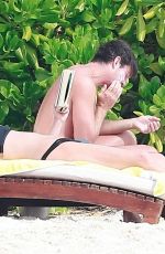 REBECCA ROMIJN in Bikini on the Beach in Tulum 01/01/2018