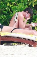 REBECCA ROMIJN in Bikini on the Beach in Tulum 01/01/2018