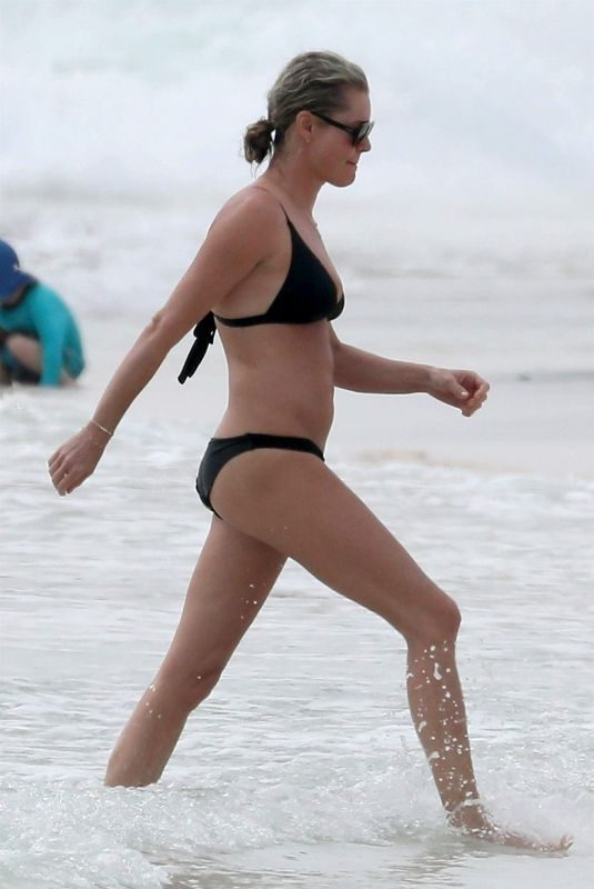 REBECCA ROMIJN in Bikini on the Beach in Tulum 01/01/2018