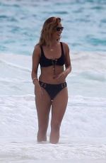 ROSIE HUNTINGTON-WHITELEY in Bikini on the Set of a Photoshoot at a Beach in Bahamas 01/09/2018
