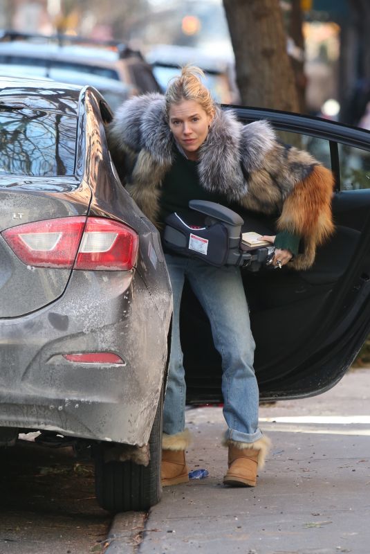 SIENNA MILLER Unloading Her Car in New York 01/14/2018