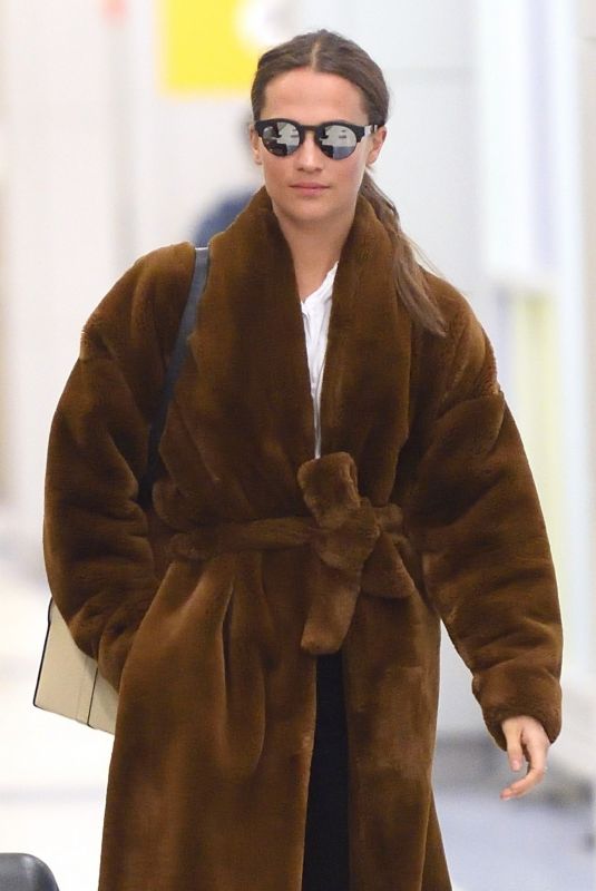 ALICIA VIKANDER Arrives at JFK Airport in New York 02/20/2018