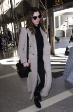 ANNE HATHAWAY Arrives at LAX Airport in Los Angeles 02/25/2018