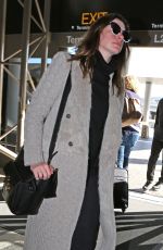 ANNE HATHAWAY Arrives at LAX Airport in Los Angeles 02/25/2018