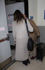 ANNE HATHAWAY Arrives at LAX Airport in Los Angeles 02/25/2018