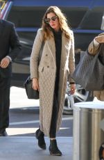 ANNE HATHAWAY Arrives at LAX Airport in Los Angeles 02/25/2018