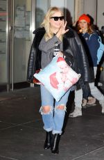 ASHLEY BENSON Out at Times Square in New York 02/09/2018