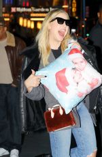ASHLEY BENSON Out at Times Square in New York 02/09/2018