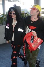 BELLA THORNE and Mod Sun at LAX Airport in Los Angeles 02/25/2018