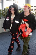 BELLA THORNE and Mod Sun at LAX Airport in Los Angeles 02/25/2018