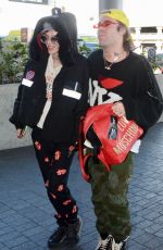 BELLA THORNE and Mod Sun at LAX Airport in Los Angeles 02/25/2018