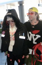 BELLA THORNE and Mod Sun at LAX Airport in Los Angeles 02/25/2018