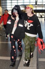 BELLA THORNE and Mod Sun at LAX Airport in Los Angeles 02/25/2018