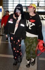 BELLA THORNE and Mod Sun at LAX Airport in Los Angeles 02/25/2018