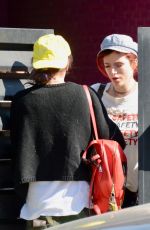 BELLA THORNE and Mod Sun at LAX Airport in Los Angeles 02/25/2018