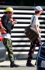 BELLA THORNE and Mod Sun at LAX Airport in Los Angeles 02/25/2018