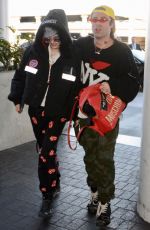 BELLA THORNE and Mod Sun at LAX Airport in Los Angeles 02/25/2018