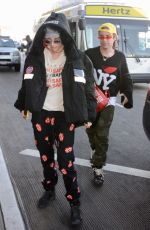 BELLA THORNE and Mod Sun at LAX Airport in Los Angeles 02/25/2018