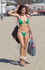 BLANCA BLANCO in a Green Bikini and Ugg Boots Out at Venice Beach 02/07/2018
