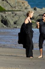 CHARLIZE THERON on the Set of a Photoshoot at Malibu Beach 02/16/2018