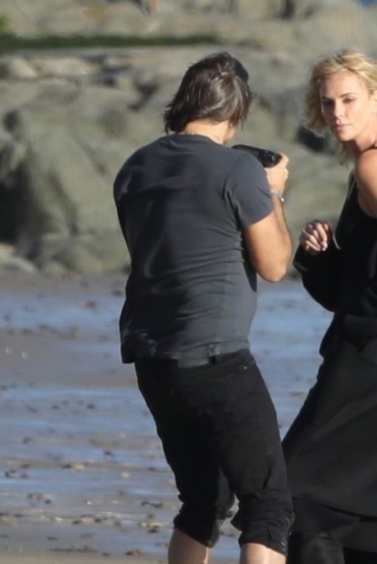 CHARLIZE THERON on the Set of a Photoshoot at Malibu Beach 02/16/2018