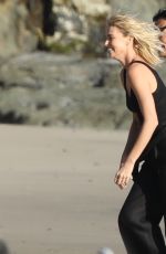 CHARLIZE THERON on the Set of a Photoshoot at Malibu Beach 02/16/2018