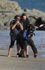CHARLIZE THERON on the Set of a Photoshoot at Malibu Beach 02/16/2018