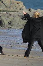 CHARLIZE THERON on the Set of a Photoshoot at Malibu Beach 02/16/2018