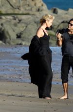 CHARLIZE THERON on the Set of a Photoshoot at Malibu Beach 02/16/2018