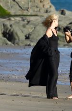 CHARLIZE THERON on the Set of a Photoshoot at Malibu Beach 02/16/2018