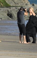 CHARLIZE THERON on the Set of a Photoshoot at Malibu Beach 02/16/2018