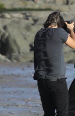 CHARLIZE THERON on the Set of a Photoshoot at Malibu Beach 02/16/2018