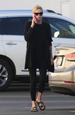 CHARLIZE THERON Out and About in Van Nuys 02/20/2018