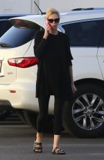 CHARLIZE THERON Out and About in Van Nuys 02/20/2018